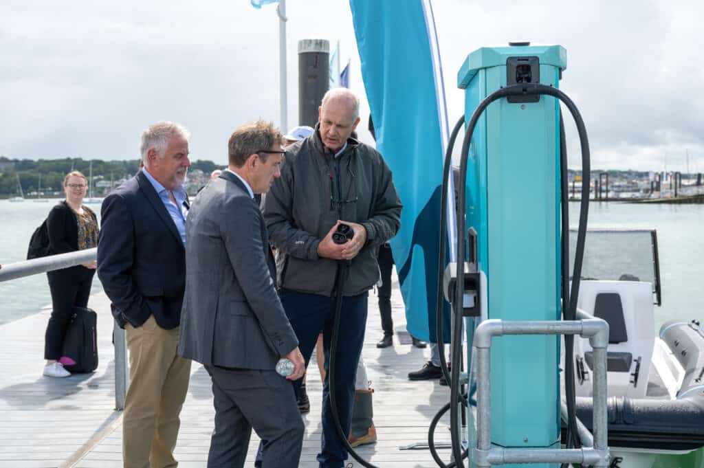 Aqua superPower CEO continues to explain how the fast chargers are operated to Cowes Harbour CEO Gary Hall and MP Bob Seely