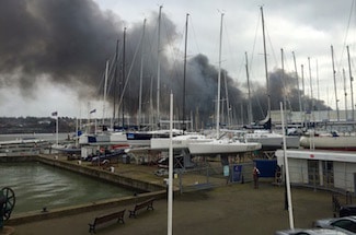 Smoke from the Medina Village fire blows down the river