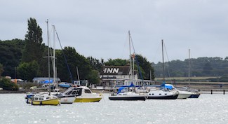 The Folly Inn and moored boats