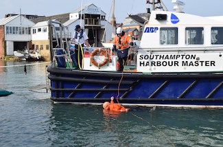 Pilot boat crew rescue pilot from water