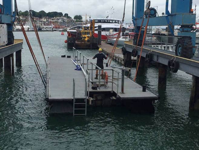 Repaired pontoon section of Trinity Landing leaves Venture Quays
